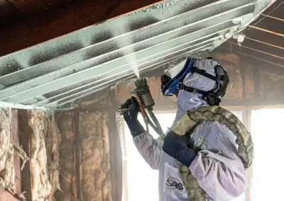 foam-co-contractor-spraying-energy-efficient-polyurethane-foam-insulation-onto-attic-rafters-st-louis-mo.