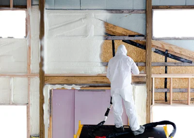 professional-installer-spraying-polyurethane-foam-insulation-on-interior-wall-cavities